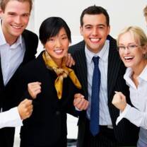 group of men and women laughing