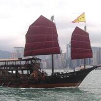 huge sailing ship in the middle of an ocean