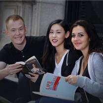 men and women reading books