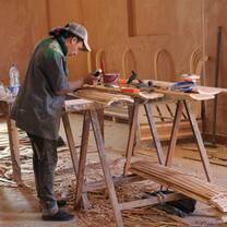 man woodworking and building