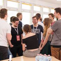 group of people talking to each other