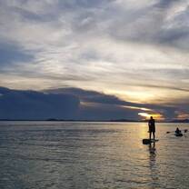 sunset paddleboard