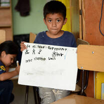 Boy with whiteboard