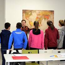 Volunteer as an English teacher assistant
