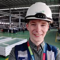 Me at a factory with my colleagues.
