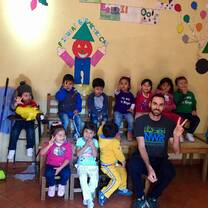 Me with the kids that I volunteered with in 2017 (my second time)