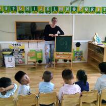 Female teacher teaching kindergarten