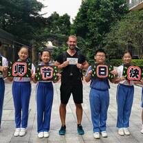 Male teacher with students