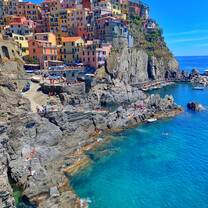 Gorgeous view from my hike in Cinque Terre, the town of Manarola is pictured