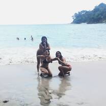This is a picture of me and my two friends on the beach at Manuel Antonio.