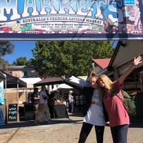 Another student and I visiting a local market
