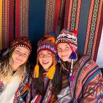 Dressed in fun Peruvian ponchos!