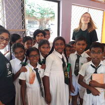 Community work decorating classrooms with lots of smiles! 