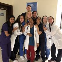 Fellow students and I with our mentors at the private clinic