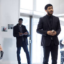 Actors rehearsing in a sunny studio