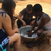 Our translator Jamila taking pity on us while we attempted to do laundry :')