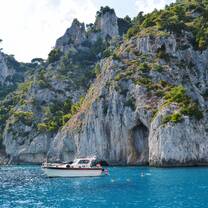 View of blue water & a boat