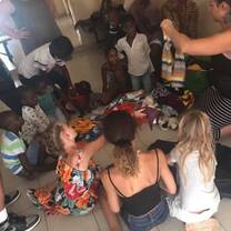 given out clothes to the locals