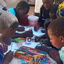 Children doing a colouring activity 