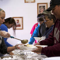 Students serving meals