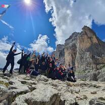 Hike with campers in the Dolomite mountain range