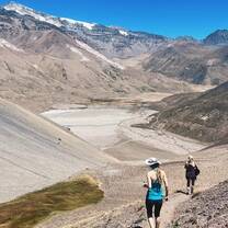 Intern in Chile hiking the Andes mountains as part of their adventure and cultural experience