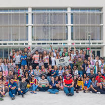 Group shot of FIU ELI students holding their country's flags.