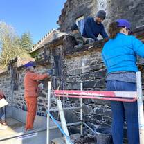 Repointing castle wall