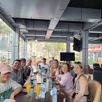 students in a cafe practicing their English in Dubai