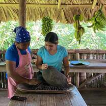 A participant works with cocoa beans. 