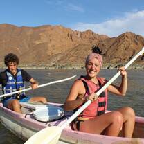 exchange students enjoying canoeing in Africa