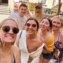 Students posing on street in Prague