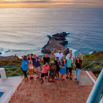Adult students toasting with a view after a wine tasting