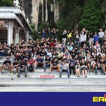 large group photo in front of building