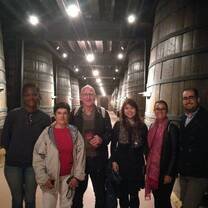 students in a wine cellar 