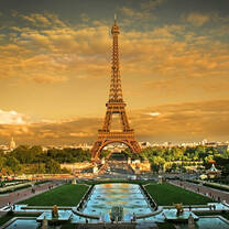 The Eiffel Tower glows in sunlight in front of the Trocadero