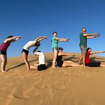 Students spell out CGEE in the Dunes in Namibia
