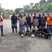 Our volunteers and players in a together photo
