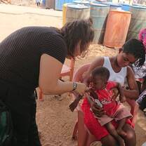 Vaccinating a child in the community