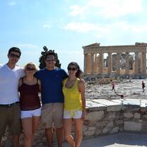 Students smiling in front of the Parthenon