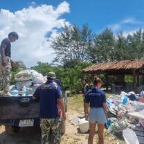 Volunteers take part on the beach cleanup event