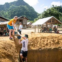 Students doing service in a remote Thai village