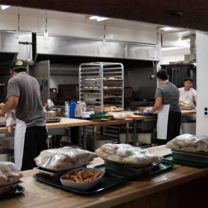 Working in a kitchen at camp