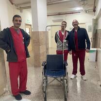 Transport team with a wheelchair