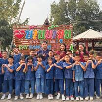 Kids doing heart with their hands