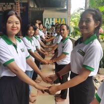 Students holding hands