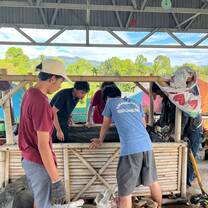 Our volunteers working on our regenerative farming project