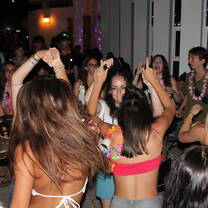 Students enjoying the themed farewell party held every Friday.