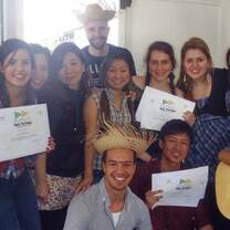 students smiling in sao paulo brazil holding certificates