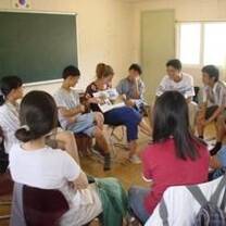 Volunteer teaching in a classroom